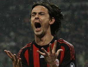 AC Milan's Filippo Inzaghi reacts after missing a goal opportunity against Reggina during their Italian Serie A soccer match at the San siro stadium in Milan February 7, 2009. REUTERS/Aless<script><figcaption id=